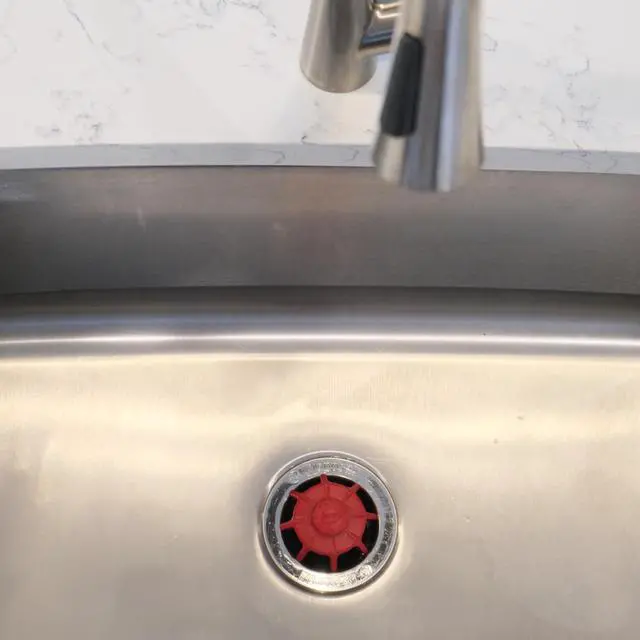 Alt view image 2 of 7 - Disposal Genie Garbage Disposal Strainer | Kitchen Sink Drain Splash Guard | Food Scraper | Red (10451)