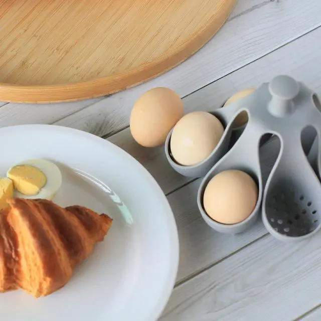 Alt view image 7 of 7 - Silicone Egg Boiler Rack for Hard Soft Boiled Eggs, Food Grade Silicone Egg Boiler Cooker with 6 Holders, Kitchen Gadget for Cooking/Serving Eggs with Handle, Dishwasher Safe