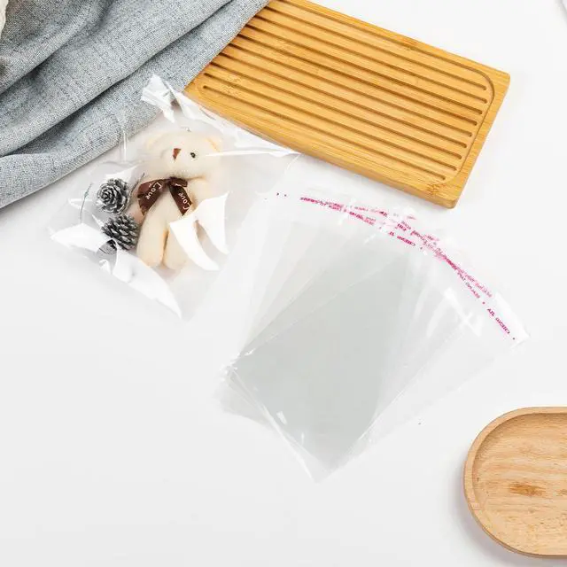 Alt view image 5 of 7 - 100Pcs Clear Self Sealing Cellophane Bags, 4x6 Inches Self-Adhesive Cookies Bag Plastic Candy Resealable Treat Bags for Bakery Cookies Gift Packing Party Favor