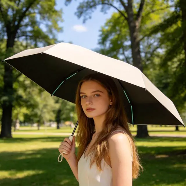 Alt view image 7 of 7 - Mini Folding Travel Umbrella with Built-in Hidden Telescoping Handle,Teflon Coating, UPF 50+,UV Protection,Compact Lightweight Portable,6 Ribs Design,Small,Sun/Rain,Women/ Kids/Girls,Backpack Car