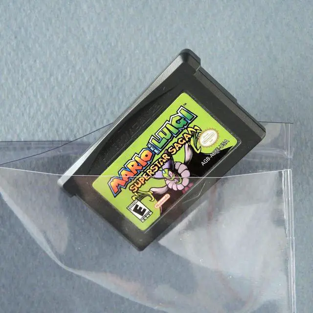Alt view image 2 of 2 - StoreSMART® - Plastic Pages for Video Game Cartridges/Cards - with Flaps - for 3-Ring Binders - 100-Pack - VH308F-GAME-100