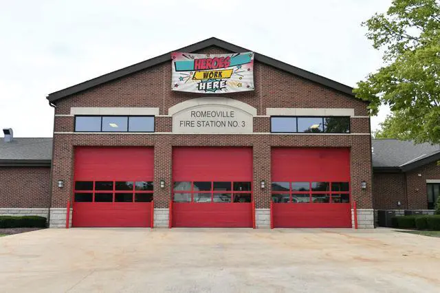 Alt view image 6 of 6 - Banner Heroes Work Here Waterproof Vinyl Banner, 7x16 Feet
