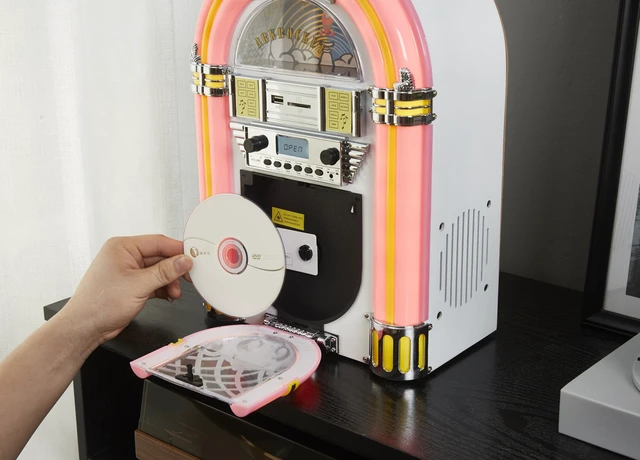 Alt view image 6 of 7 - Athena Mini Jukebox/Tabletop CD Player/Bluetooth Speaker/Radio/USB and SD Card Player with Retro LED Lighting System (Pink White)