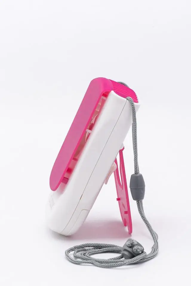 Alt view image 2 of 7 - O2COOL Deluxe Necklace Fan | Battery Powered, Hands-Free Personal Cooling Fan w/Adjustable Lanyard, Table Top Stand + Wearable Clip -Pink (2 Pack)