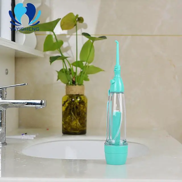 Alt view image 2 of 6 - Cordless Water Dental Flosser Non-Electric Portable, Manual Air Pressure Simple Operation, Bottle Strengthening Dental Oral Irrigator for Home & Travel, Green.