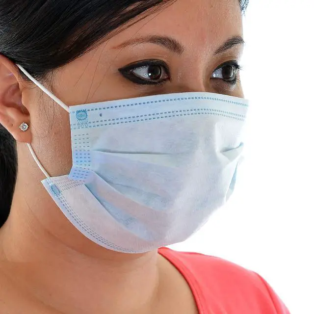 Alt view image 6 of 7 - Disposable Face Masks - 50 Pack Blue Adult Earloop | 3-Layer Construction, Fluid-Resistant Fabric, Flexible Nose Piece, Extra-Soft Elastic Loops, Standard Fit