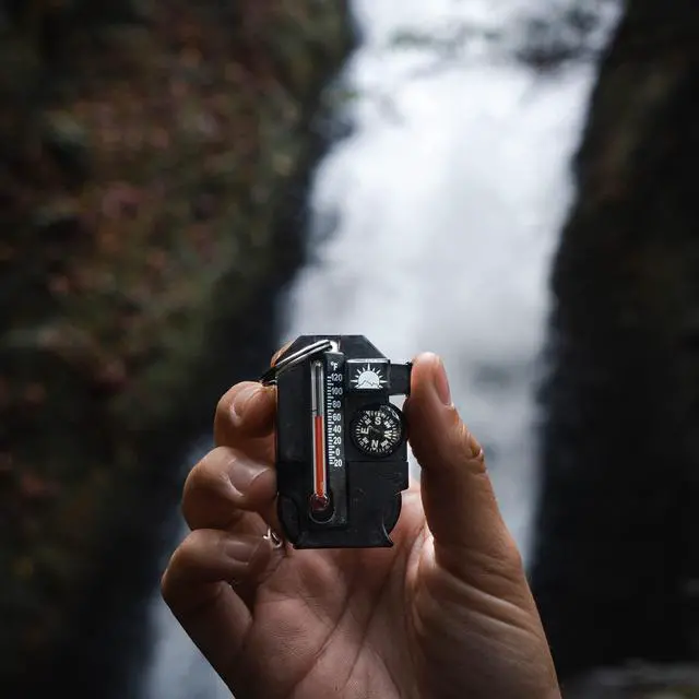 Alt view image 2 of 7 - Outsider - 4-in-1 Survival Multi-Tool | Compass, Thermometer, Whistle, and Fire Starter in a Compact Zipper Pull | Outdoor Gadget for Backpacking, Camping, or Survival Situations