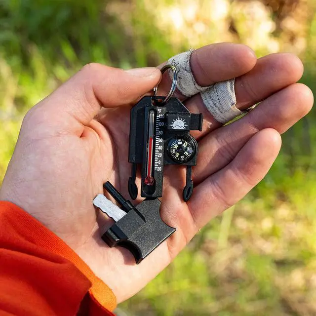Alt view image 3 of 7 - Outsider - 4-in-1 Survival Multi-Tool | Compass, Thermometer, Whistle, and Fire Starter in a Compact Zipper Pull | Outdoor Gadget for Backpacking, Camping, or Survival Situations