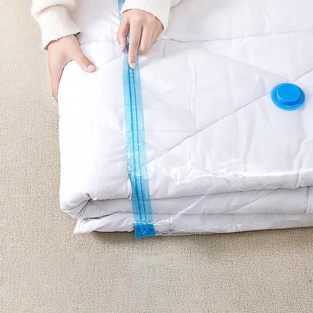 Alt view image 4 of 6 - Vacuum Storage Bags with Air Pump, 6 Pcs 31.5 Inch x 23.6 Inch PE Compression Down Jackets Arrange Bags for Saving Closet Space (6)