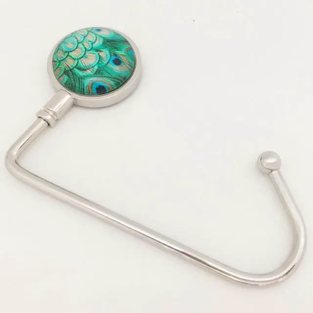 Alt view image 2 of 5 - Purse Hook Hanger for Table Bar Handbag Hanger Safer Cleaner Bag Table Hanger with Velvet Pouch (Peacock Feather)