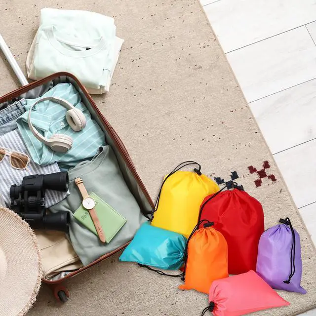 Alt view image 6 of 7 - Drawstring Bag with Toggle, Stuff Sack String Waterproof Travel Storage Bags Cinch Stuff Pouch 10" x 12" & 3 Pack & Orange -Fitting for (Gym/Traveling/Hiking/Yoga/Office/Shoes)
