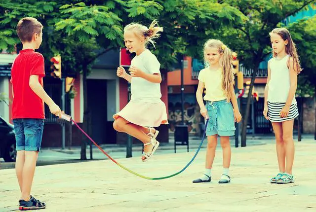 Alt view image 6 of 7 - 16 FT Long Jump Rope for Kids, 2 Pack Adjustable Double Dutch Skipping Rope with Wooden Handle, Multiplayer Rainbow Jumping Rope for Outdoor Fun, School Sport, Party Game