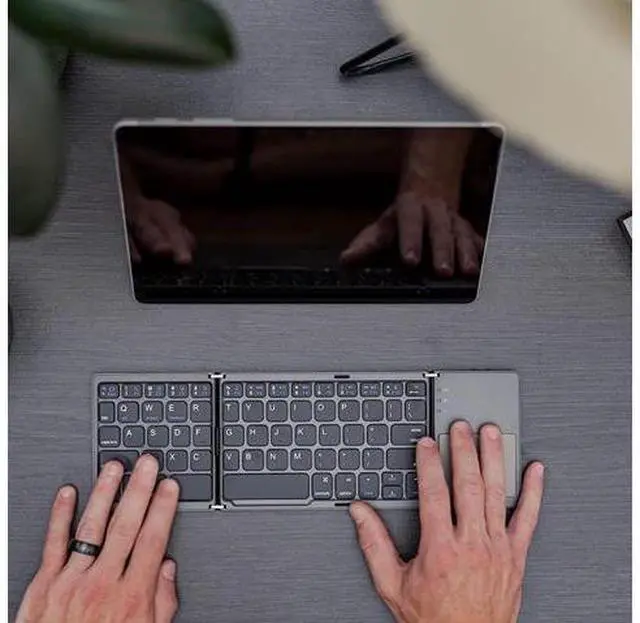 Alt view image 9 of 12 - Ultra Slim Pocket Foldable Bluetooth Wireless Keyboard with Touchpad