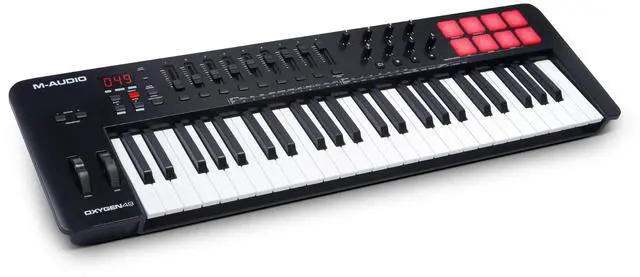 Main image of Oxygen 49 (MKV) Key USB MIDI Keyboard Controller with Beat Pads, Smart Chord, Scale Modes, Arpeggiator and Native Instruments Sound Package (NKS Integration)