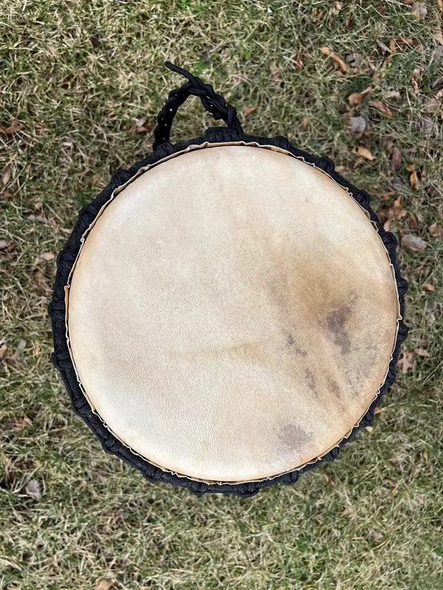 Alt view image 3 of 4 - Djembe Standard Line Carved Mahogany Wood with Natural Goat Skin, 24" Tall, 12" Head, Model NK047