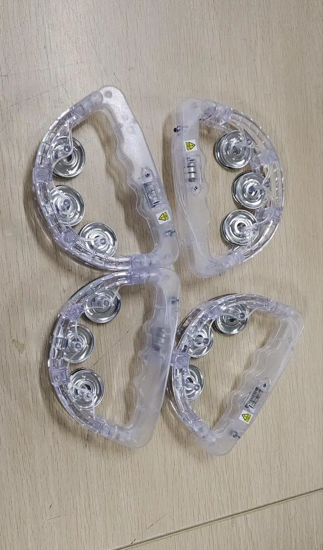 Alt view image 2 of 7 - 24 Pack LED Light up Tambourines Musical Flashing Tambourine Toys Handheld Percussion Instrument Glow in The Dark Party Supplies for Teenagers Adults Wedding Party Favors (White)