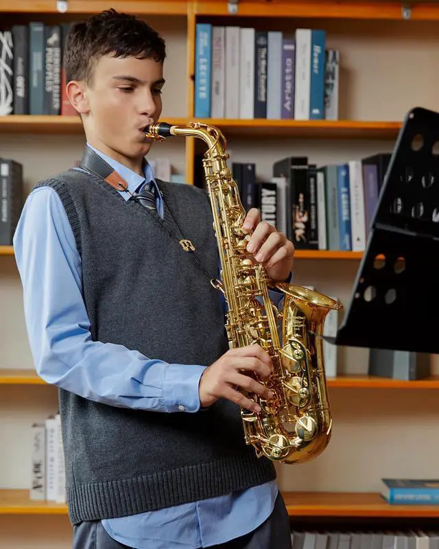 Alt view image 5 of 7 - Student Alto Saxophone E Flat for Beginner Sax Full Kit with Carrying Case, Mouthpiece, Straps, Reeds, Stand, Golden Lacquer, AS-