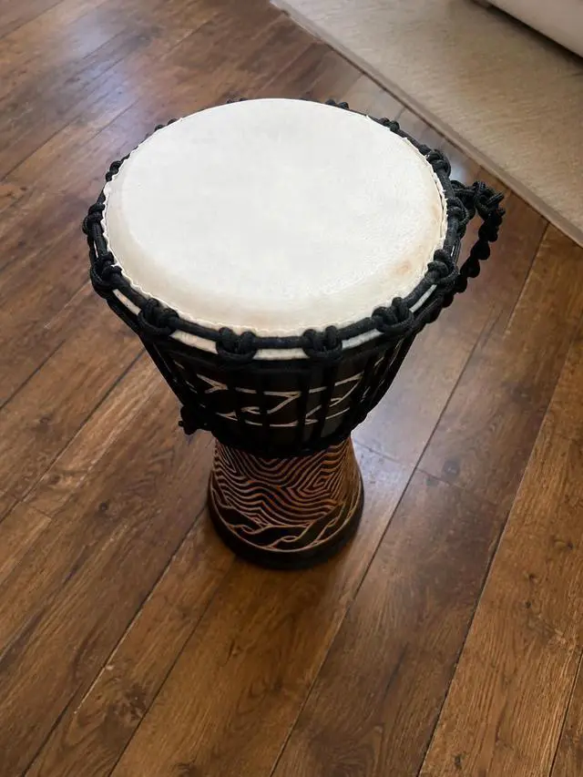 Alt view image 2 of 4 - Djembe Standard Line Carved Mahogany Wood with Natural Goat Skin, 16" Tall, 8" Head, Model NK047