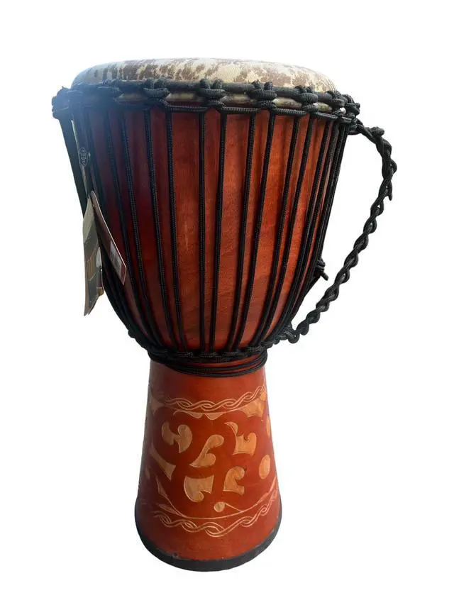 Alt view image 2 of 5 - Djembe Standard Line Carved Mahogany Wood with Natural Goat Skin, 24" Tall, 12" Head, Model NK149
