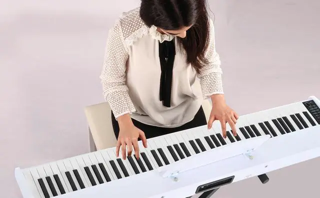Alt view image 3 of 7 - Digital Piano 88 Key Weighted with Piano Bench, 88 Key Full Size Semi Weighted Keyboard Piano, Electronic Piano for Beginner,with Adjustable Stand,Carrying Case,Sustain Pedal,Headphone (White)