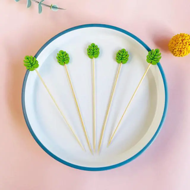 Alt view image 3 of 6 - 200 PCS Green Monstera Leaf Cocktail Picks 5 Inch Long Fancy Bamboo Toothpicks for Appetizers Skewers Sticks Food Garnish for Drinks Fruit Summer Tropical Hawaiian Palm Jungle Party Decorations