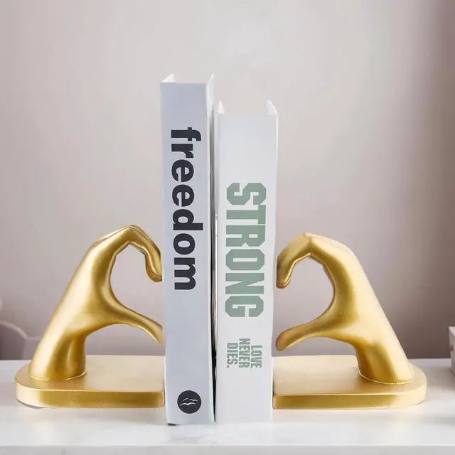 Alt view image 4 of 7 - 2Pcs Gold Heart Hands Book Ends, Non-Slip Heavy Duty Bookends for Shelves | Unique Sculptural Book Stopper for Home Bedroom, Living Room & Office Desk Decor