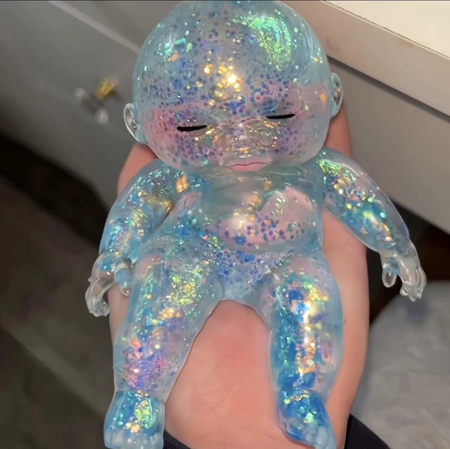 Alt view image 5 of 6 - Baby Squishy Glitter Slow Rising | Cute Sparkly Sensory Decompression Doll for Adults, Portable Relief Anxiety Stress Ball, Desk Decor & Gift (pink+blue+purple)