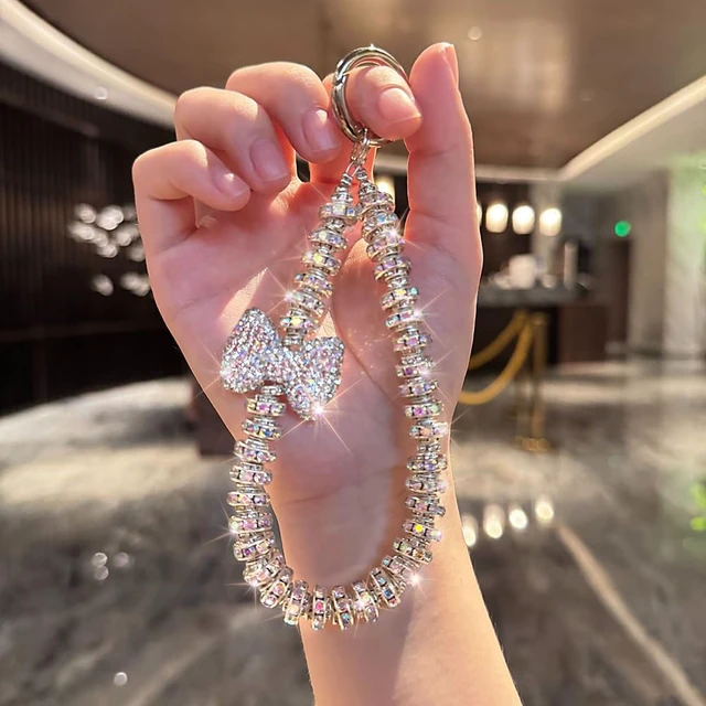 Alt view image 2 of 7 - Luxury Diamond Phone Wrist Strap Phone Lanyard With Phone Tether Tab Shiny Rhinestone Phone Chain Phone Charm Phone Strap Wrist Lanyard for Keys Bow keychain Wristlet Cell Phone Lanyards for Women