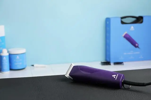 Alt view image 5 of 7 - Andis 24820 EasyClip 7-Piece Detachable Ceramic Blade Clipper Kit, Purple | Single-speed quiet comfortable motor, 12ft power cord, dog grooming kit with 4 combs