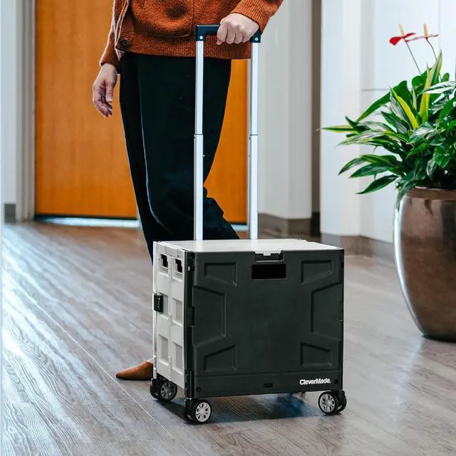 Alt view image 7 of 7 - Collapsible Rolling Crate with Lid, 55L, 4-Wheel, Cool Gray | Four swivel wheels move in any direction, while the telescoping handle guides up to 100 lb. Folds to 3.75 inches for storage