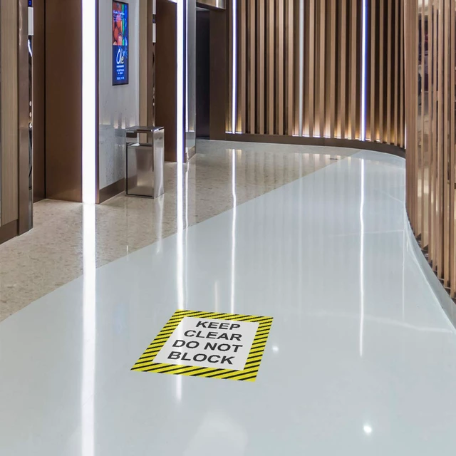 Alt view image 3 of 6 - Keep Clear Do Not Block Vertical Floor Decals Anti-Slip 24 in Longer Side Keep Clear Do Not Block Sticker Vertical Shape Black Yellow Lifestyle Industrial Signs Stickers