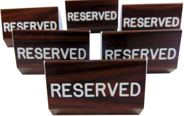 Main image of Reserved Sign for Church Pew Wood Grain Dual Sided Clamp On 6 Inch Set of 6 Durable plastic build, secures without damage, for weddings or events, bold visible lettering, includes six matching signs