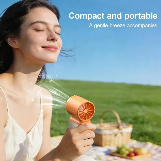 Alt view image 4 of 7 - Mini Portable Handheld Turbo Fan USB Rechargeable Cooling Fan Up to 15 Hours Orange