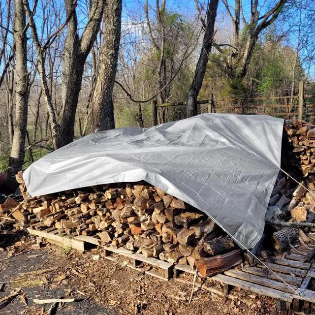 Alt view image 2 of 7 - Tarps Heavy Duty Waterproof 10x12 FT,Sliver 12 Mil Large Tarps with Grommets and Reinforced Edges,UV Resistant,Tear&Fade Resistant,Finished for Outdoors Patio Boat,Roof,Camping,10x12 FT