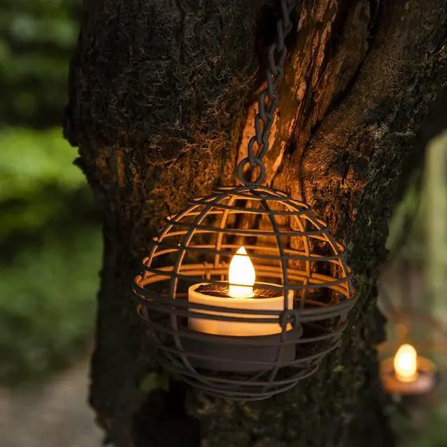 Alt view image 2 of 7 - Solar Hanging Lanterns Outdoor Waterproof, Rust Iron Ball Candle Holder with Flickering Solar Powered Tea Lights, Perfect Chargeable Solar Lights for Backyard Patio Garden Fence Tree Decoration-4Pack