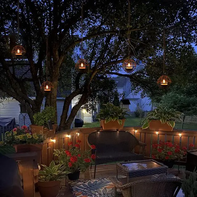 Alt view image 6 of 7 - Solar Hanging Lanterns Outdoor Waterproof, Rust Iron Ball Candle Holder with Flickering Solar Powered Tea Lights, Perfect Chargeable Solar Lights for Backyard Patio Garden Fence Tree Decoration-4Pack