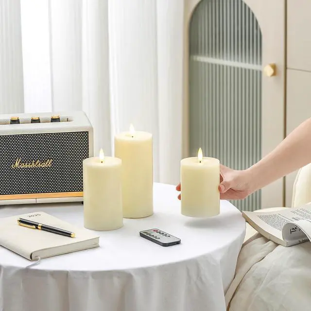 Alt view image 5 of 7 - Ivory Flameless Candles with Remote and Timer, Real Wax Made LED Pillar Candles Battery Operated with 3D Flickering Flame - 3" x 4",5",6" - Set of 3
