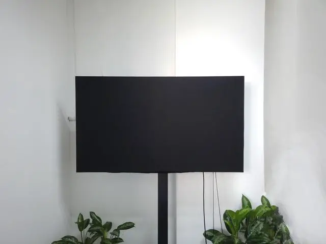 Alt view image 7 of 7 - Indoor TV dust cover, elastic fabric with adjustable size, Suitable for most brands of 76-85 inch flat or curved TVs(Black, 76 - 85 inches)