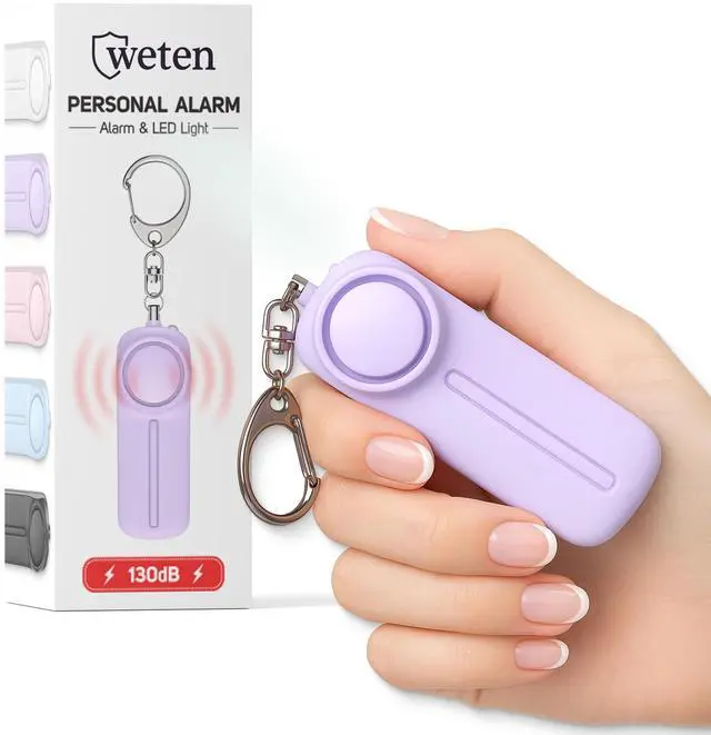 Main image of Personal Safety Alarm Keychain - 130dB Siren, LED Light, Panic Pin Compact Self-Defense Device and Emergency Whistle Alternative for Women, College, Travel, and Night Walk Protection (Purple)