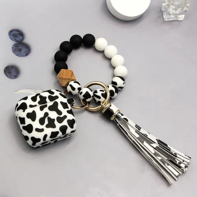 Alt view image 6 of 7 - Case Compatible with AirPods 4 Case,Soft Silicone Cover with Bracelet Lanyard and Keychain, Cute Wireless Charging Protective Case for Apple AirPods 4th for Women and Men (Cow)