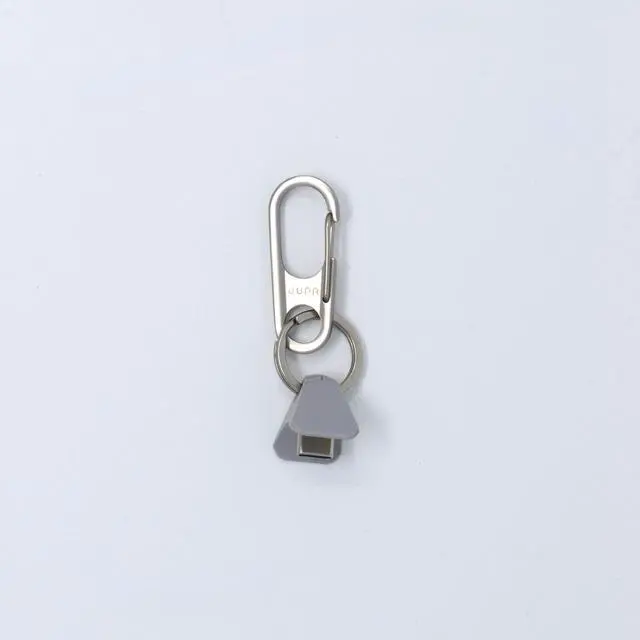 Alt view image 2 of 7 - Anchor for AirPods, Silver & Gray Carabiner Clip, Keychain & Lanyard | The only patented AirPods carry solution that attaches through the charging port. Both Lightning and USB-C Anchors included