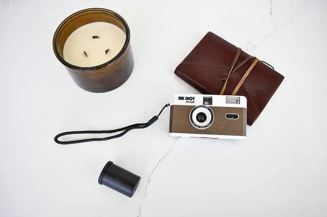 Alt view image 2 of 4 - Point and Shoot 35mm Film Camera, Reusable Retro Half Frame Camera, Built in Flash, Included One Roll ASA/ISO 400 Black & White Film 18 Exp., (36 Shots) Battery Not Included (Brown Color)