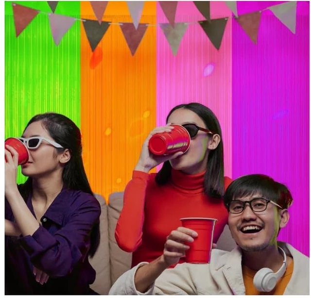 Alt view image 3 of 6 - 4 Pack Glow in The Dark Curtains Party Supplies 6.6 x 3.3 Ft Glow Tinsel Foil Fringe Curtains Colorful Patchwork Streamer Backdrop for Birthday Neon Party Halloween Decor (4, Green/Orange/Pink/Purple)