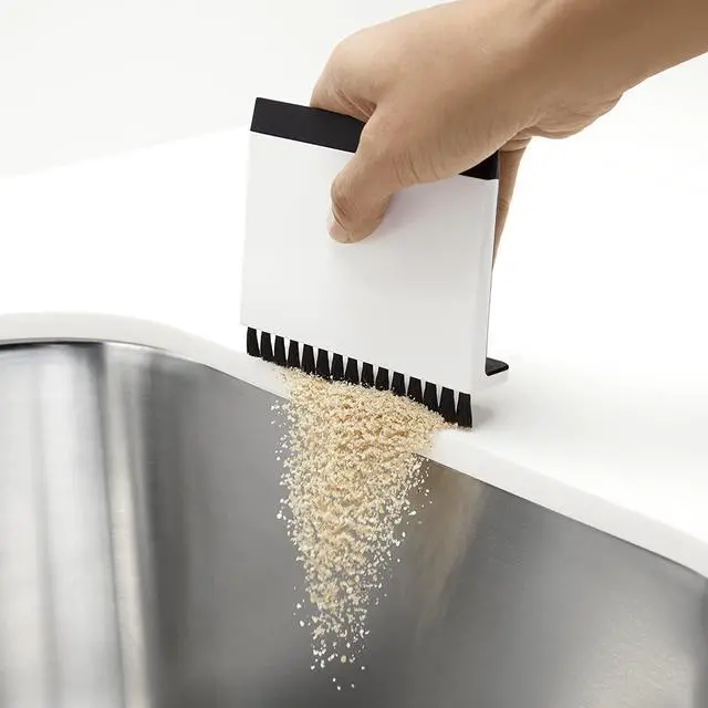 Alt view image 4 of 5 - K-6379-0 Kitchen Sink Squeegee and Countertop Brush, Multi-Purpose, Cleans Wet and Dry Spills, Dishwasher Safe, White