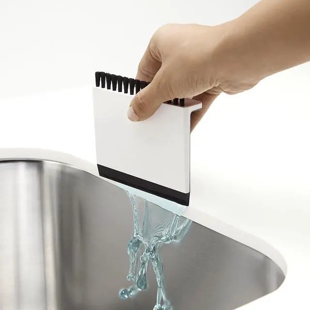 Alt view image 5 of 5 - K-6379-0 Kitchen Sink Squeegee and Countertop Brush, Multi-Purpose, Cleans Wet and Dry Spills, Dishwasher Safe, White