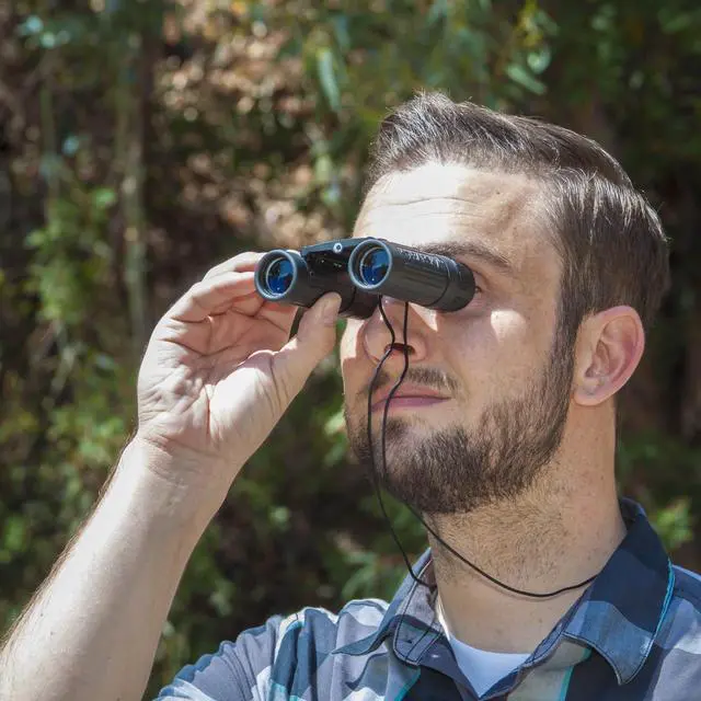 Alt view image 4 of 6 - Lucid View 10x25 Compact Binoculars Lightweight Folding Design with Fully Coated Optics & Rubber Armor Ideal for Travel, Hiking, Hunting & Sports
