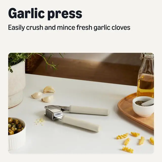 Alt view image 2 of 7 - Garlic Press, Stainless Steel, Soft Grip Handle, Dishwasher-Safe, Linen Gray