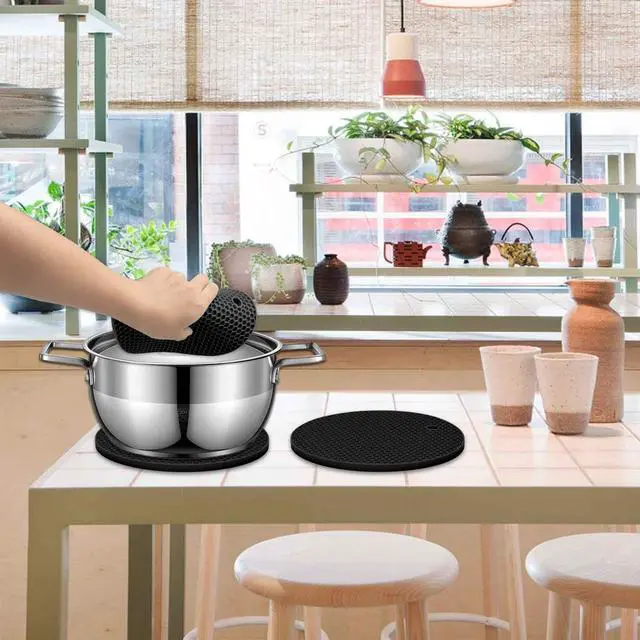 Alt view image 3 of 7 - Extra Thick Silicone Trivets Heat Resistant Pot Holder and Oven Mitts,Trivets for Hot Dishes,Nonslip Insulation Honeycomb Rubber Hot Pads for Countertop,Multi-Purpose & Flexible Mats,2 Pack Black