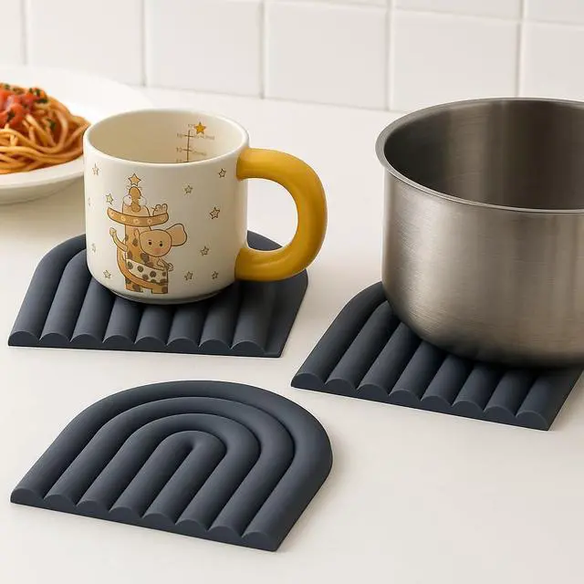 Alt view image 4 of 6 - Silicone Heat Resistant Trivet Mats Multipurpose Non-Slip Kitchen Hot Pads, Insulated Coasters & Pot Holders Modern Placemats for Dining Table & CountertopSet of 2 (Charcoal Gray)