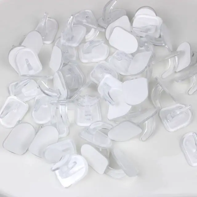 Alt view image 6 of 6 - Traceless Clear Plastic Adhesive Hooks No Damage Transparent Reusable Seamless Hooks Sticky Hangers with Non Marking Sticker for Kitchen Bathroom Bedroom Office Wall3*2.4Cm/1.18*0.94Inches